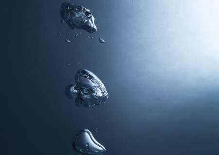 big air bubbles in water stylish blue background