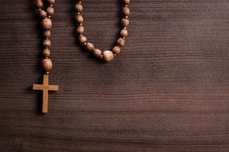 cross over brown wooden backgroundの写真素材