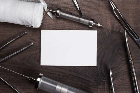 surgical armaments and blank notebook