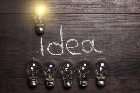 idea concept on the brown wooden backgroundの写真素材