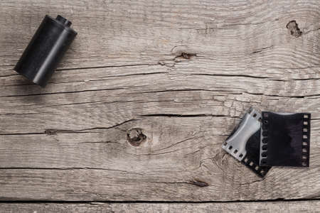 retro negative film and slides on wooden tableの写真素材