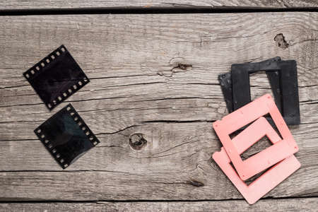 retro negative film and slides on wooden tableの写真素材