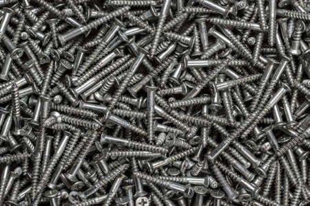 lots of screws on the table background