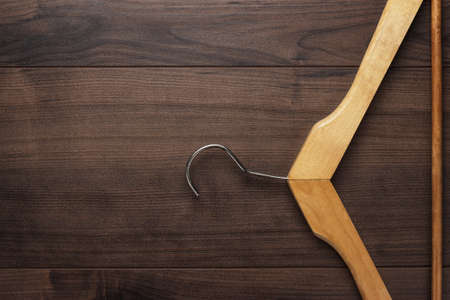 clothing hanger on the brown wooden tableの写真素材