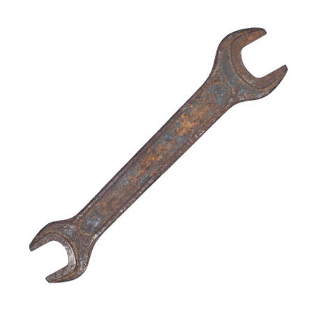 old rusty screw key isolated on the whiteの写真素材