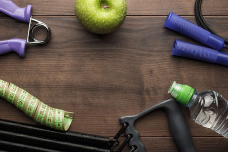 different street workout objects on the brown wooden table