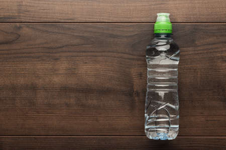plastic water bottle on the wooden tableの写真素材