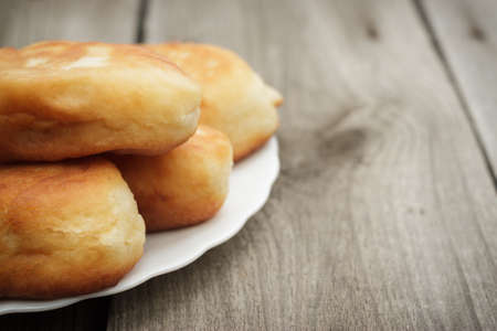 fresh baked homemade buns with cabbage insideの写真素材
