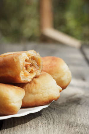 fresh baked homemade buns with cabbage insideの写真素材