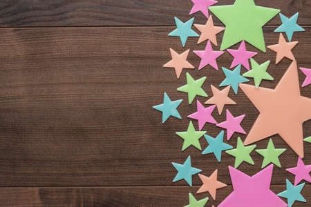 plastic toy stars on the wooden table