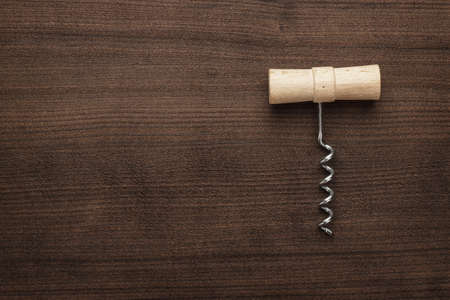 retro wooden corkscrew on the brown tableの写真素材