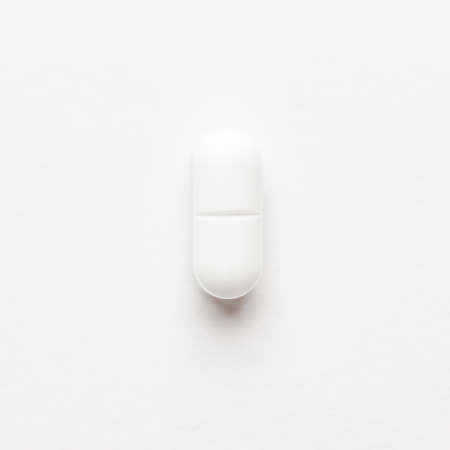 close-up of a pill on white background. not isolatedの写真素材