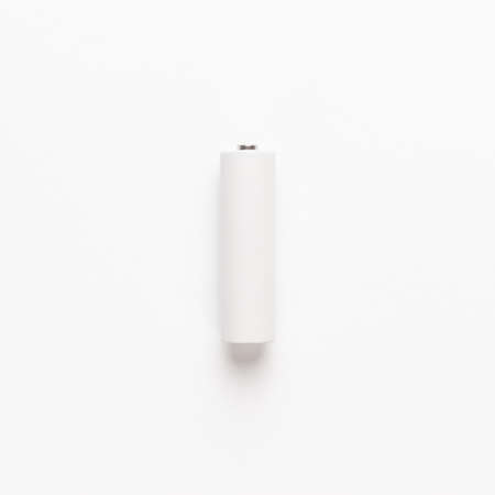 blank AA rechargeable battery over white background not isolatedの写真素材