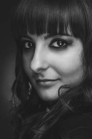 portrait of a beautiful brunette girl over backgroundの写真素材