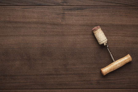 retro wooden corkscrew on the brown tableの写真素材