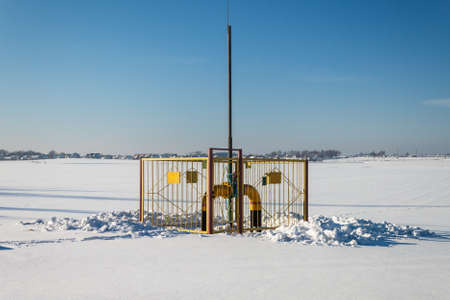 part of gas main on a sunny winter dayの写真素材