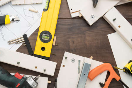 Furniture parts and tools during assembly process concept.の写真素材