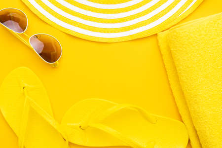 Beach accessories on the yellow