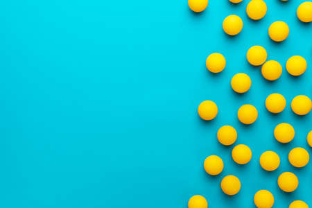 Many balls for table tennis on turquoise blueの写真素材