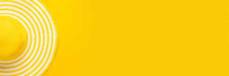 Top view of yellow striped retro hat close-up with copy spaceの写真素材