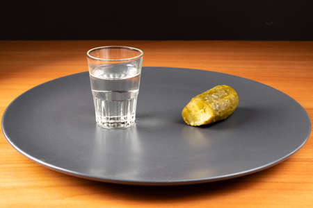 Glass with vodka, sake. Snack and alcohol.の写真素材