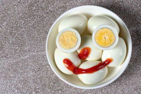 Merry fried eggs. Boiled eggs are smiling.
