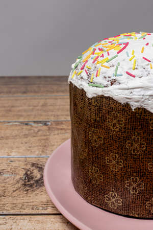 Bright Easter holiday. Festive Easter cake with raisins on a plate. Religion.