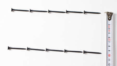 Self-cutters on a white background banner with space for text. Construction tools, self-tapping...