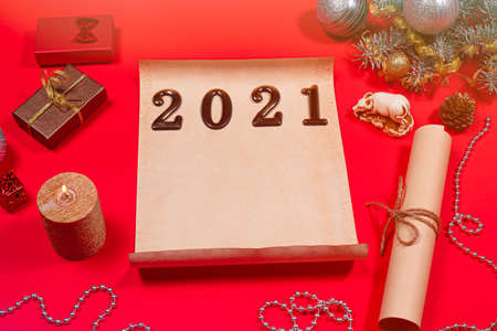A beautiful Christmas card featuring 2021 figures on a red background. New Year, festive mood, year...