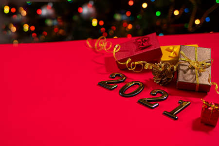 A beautiful Christmas card a red background, festive mood, year of the bullの写真素材