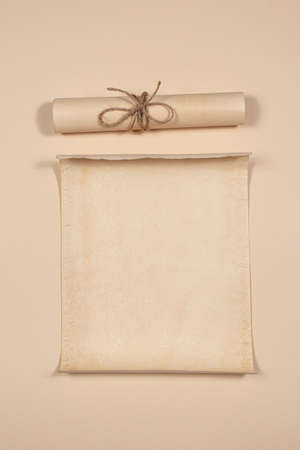 Parchment scroll for the to-do list on a beige background. Glider, day planning, place for text and for entries.の写真素材