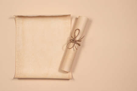 Parchment scroll for the to-do list on a beige background. Glider, day planning, place for text and for entries.の写真素材