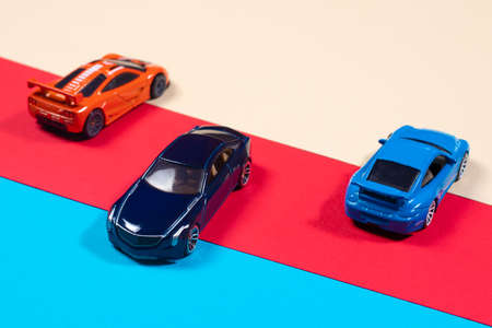 08 November 2020 Ukraine, Zaporizhzhya. Colorful models of toys cars. For toy store toy typewriter...