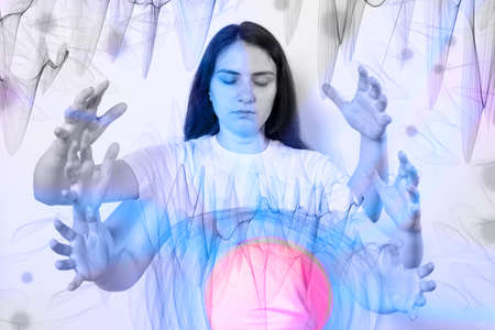 A woman with six arms and a glowing ball. Quantum Theory and Reality Management