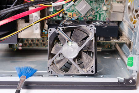 Dirty cooler ventilation system unit computer, cleaning from dust.の写真素材