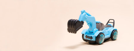 Blue excavator plastic machine on white background. Construction machinery car for digging for toy store and children.の写真素材