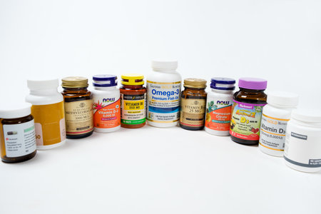 A lot of jars with dietary supplements on a white background, a long banner. 19 May 2022, Ukraine, Zaporozhyeのeditorial素材