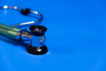 Stethoscope on a blue background, a place for text. Medicine, pulmonology and cardiology, bannerの写真素材