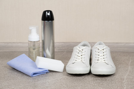 White leather shoe cleaning kit - water-repellent spray, foam, rag and sponge.の写真素材