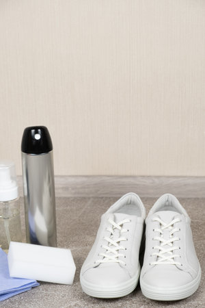 White leather shoe cleaning kit - water-repellent spray, foam, rag and sponge.の写真素材