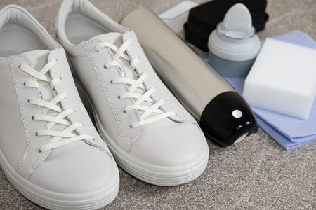 White leather shoe cleaning kit - water-repellent spray, foam, rag and spongeの写真素材