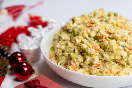 Olivier Russian salad on a Christmas and New Year background, top view.の写真素材