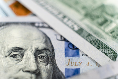A lot of 100 dollar bills close-up macro