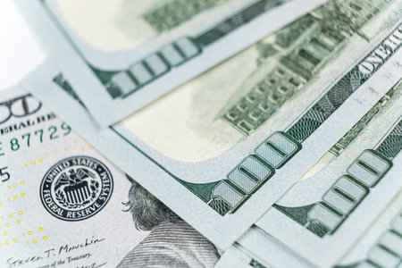 A lot of 100 dollar bills close-up macro.