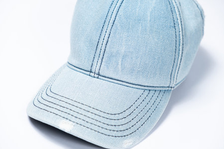 Blue denim cap close-up on white background
