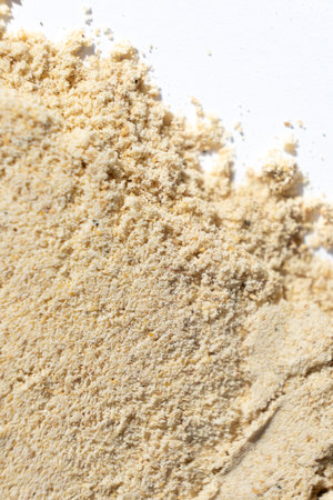 Abstract beige ground ginger background. Creativity in cooking.