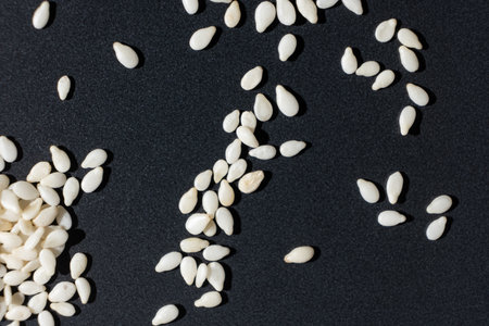 Macro kernels of white roasted sesame seeds.の写真素材