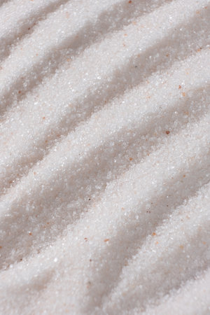 Natural Himalayan Pink Salt Fine Ground Top View Abstract Texture Vertical Background