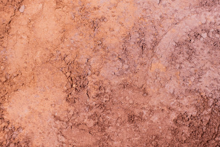 Macro texture of different shades of eyeshadow top view.