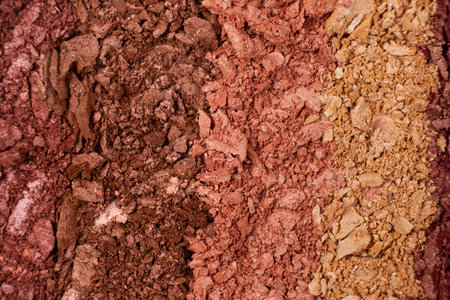 Macro texture of different shades of eyeshadow top view.